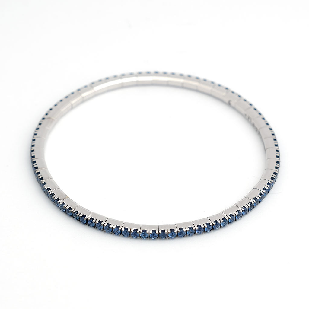 ex-tensible_armband_tennis2_weissgold_blaue_safire_auf_kegel